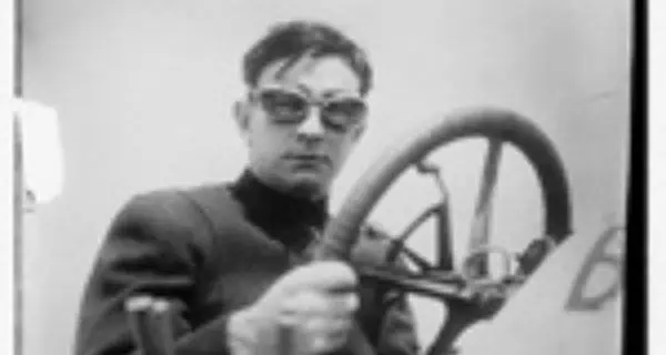 man holding a steering wheel