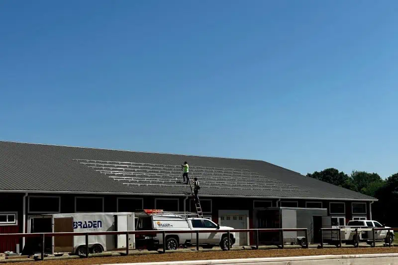 Installing solar panels for Staff Five Star Life.
