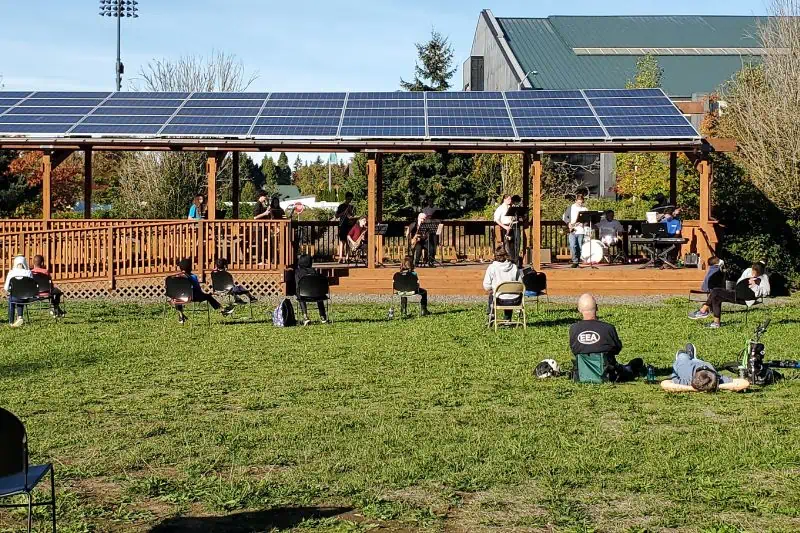 people watching a band play outside