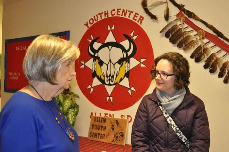 two women talking at a youth center in Allen, SD