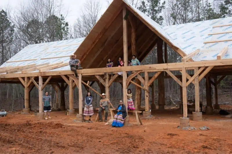 people at the site of a new structure that is being built