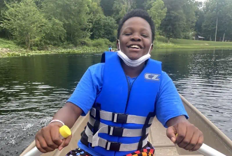 five star life kid in row boat