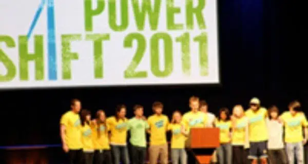 power shift 2011 sign above a group of people