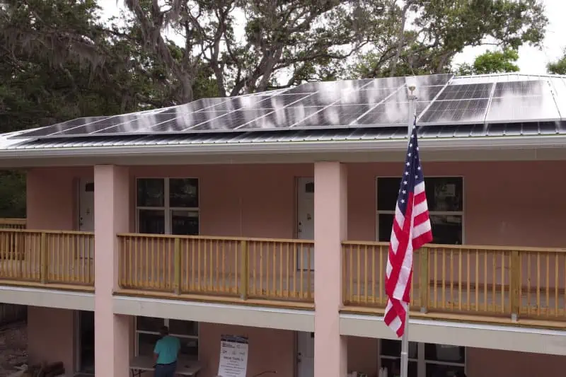 Solar on roof for St Johns Housing Partnership project.