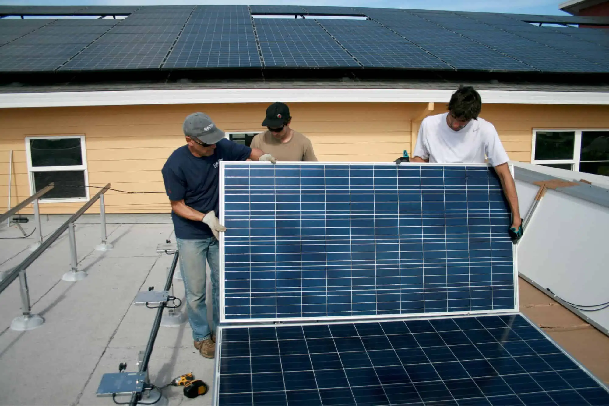 Mary Isaak Center solar panels being installed on the roof