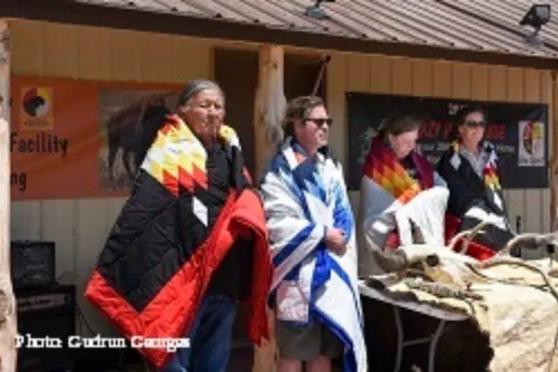 People on a reservation wrapped in authentic blankets