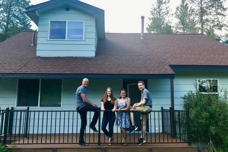 4 people on the porch at beta road house