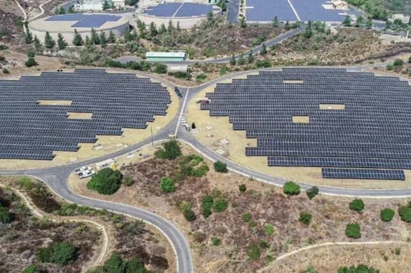 mid market solar - solar panels on top of 2 larg buildings