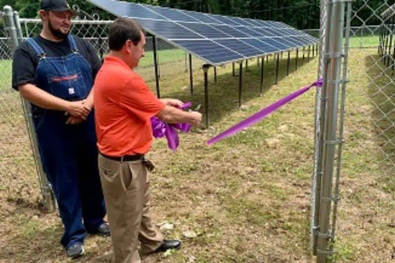 ribbon being cut at a new solar farm