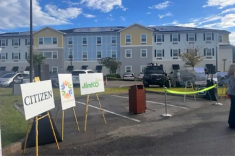 sponsor signs outside of an apartment building