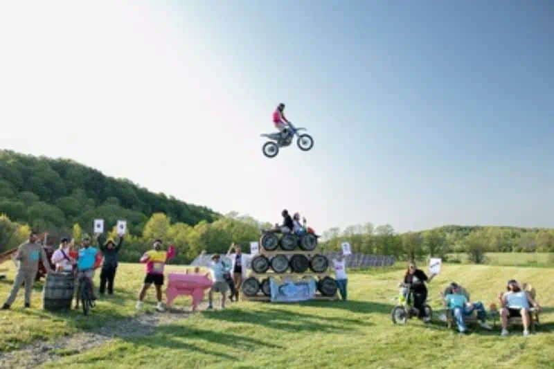 someone performing stunts on a dirt bike