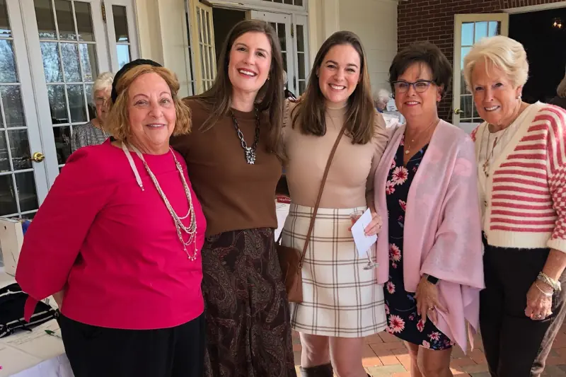 5 women standing